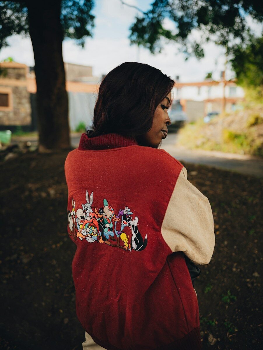Red varsity jacket with patch detail