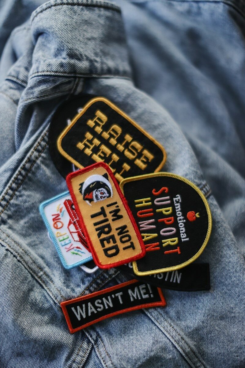 Jacket with patches worn as a sample