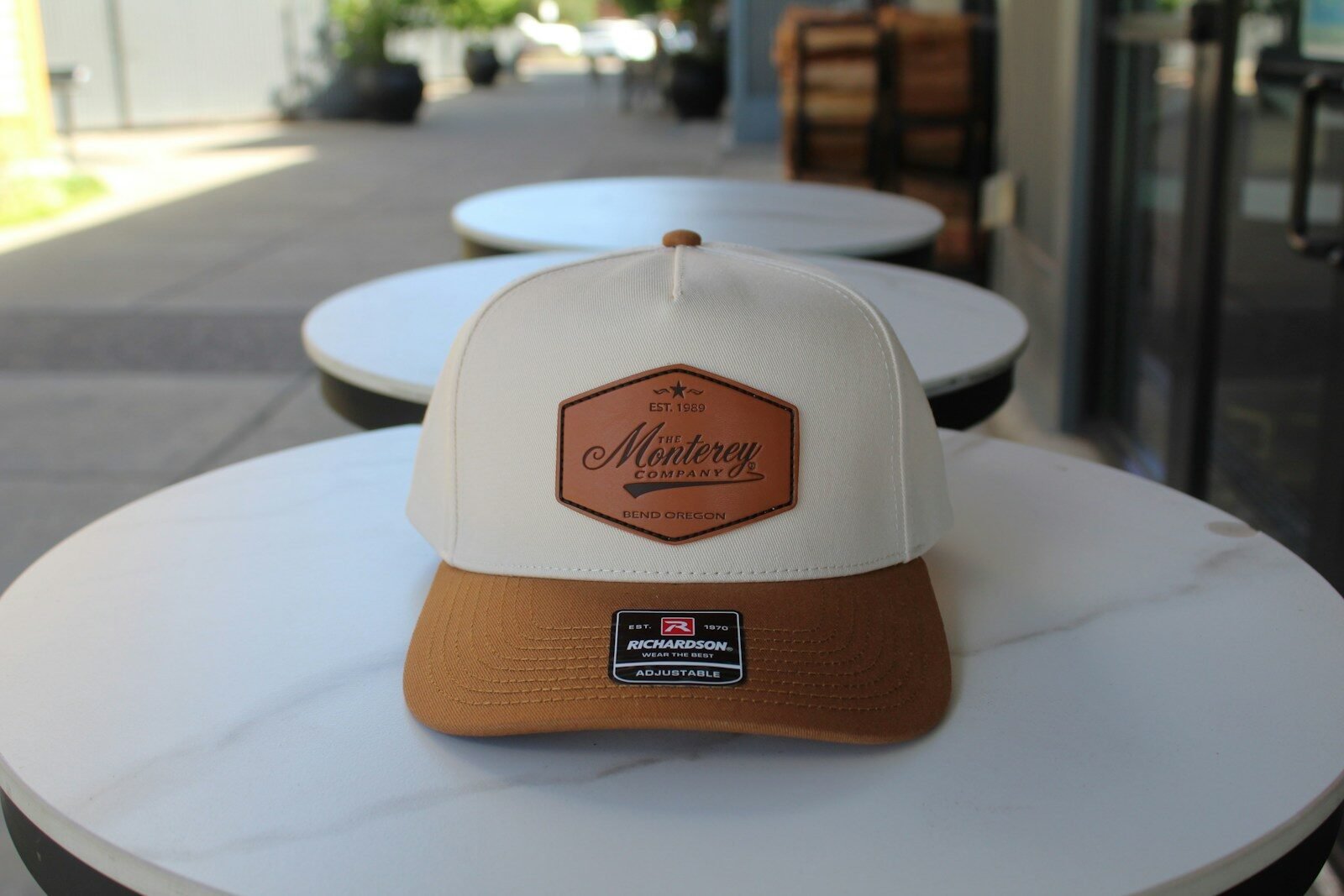 Hat with a leather patch